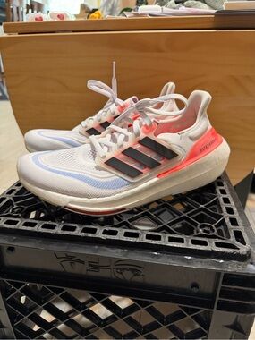 adidas Women’s Ultraboost 2022 White Sneakers with orange and blue Accents
